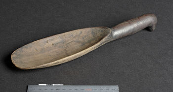 (UEM46936) A large spoon used for serving food, such as rice, to individuals during a meal. See also UEM46935 . Material: Wood. Karbi Anglong/Hamren district.