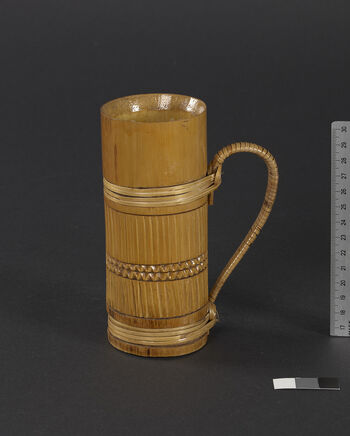 (UEM46978) The drinking cup made of bamboo is made and used by all the ethnic groups in the region. This one is finely crafted and lacquered for sale in the market and serves more as a decorative item than for practical use. Material: Bamboo. Shillong, Meghalaya district.