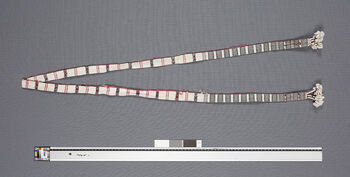(UEM46850) A wamkok is tied around the waist over a pini to keep it in place. Pattern name: Apai pi (meaning large stripes). Material: Cotton.