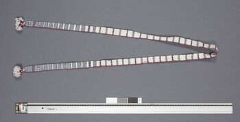(UEM46851) A wamkok is tied around the waist over a pini to keep it in place. Pattern name: Voso amek , meaning bird’s eye. Material: Cotton.