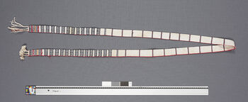 (UEM46852) A wamkok is tied around the waist over a pini to keep it in place. Pattern name:  Phongrong angsu , meaning a seed capsule with thorns, thorn apple. Material: Cotton.