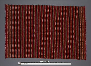 ( UEM 46859) Floor loom, weft faced weave. Material: Acryl.