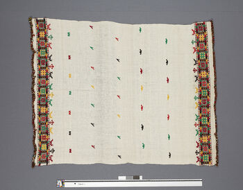 (UEM46860) Floor loom, plain weave, pick-up pattern. Eri silk/ honki , pattern in wool (wool is not available or used in Karbi textiles. This was an experiment).