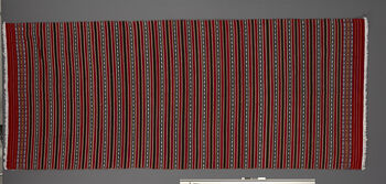 (UEM46873) Floor loom, plain weft faced weave. Used as shawl on cold days but can be draped as a pehseleng as well. Material: cotton (warp), cashmilon acryl (weft).