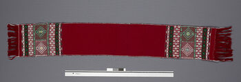 (UEM46879) Loin loom, plain weave, pick-up motifs. Used by married men. Patterns and colours have local variations. Material: Acryl.