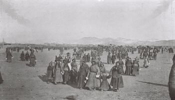 Lay people were not invited to attend the coronation ceremony at the Yellow Temple and Nine Ger Palace. According to Mongolian writer G. Navaannjil, who was present at the coronation, people were waiting for hours in the cold. This photograph was most likely captured during the long wait. While waiting, Mamen saw the arrival of 100 white camels and 300 white horses, gifts from the Mongolian people to the Bogd. Mamen concluded: 'Thus ended 1911 and the first stage of the Mongolian revolution. Mongolia had at least thrown off the Chinese administration, appointed their own emperor, and China was out of the game for the time being'.