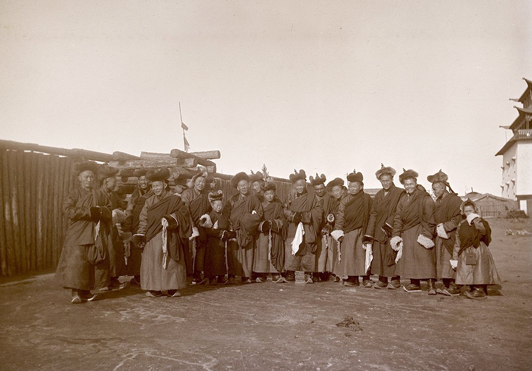 (UEMf09893_007) Monks outside the Buddhist monastery Gandantegchenlin on the day of the New Year celebration on February 7 1913. According to Krisztina Teleki and Zsuzsa Majer (and also Mamen), laypeople such as Mamen could only access the complex one day each summer, however, Mamen was let in in February and captured this photograph, again testifying to his photographic access.
