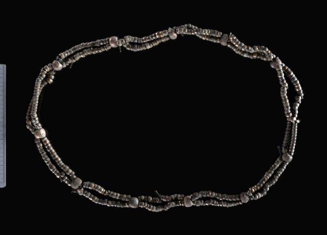The unique bead necklace from the Vestby hoard, with 353 tin-plated bronze beads. Photo: Kirsten Jensen Helgeland, Museum of Cultural History.