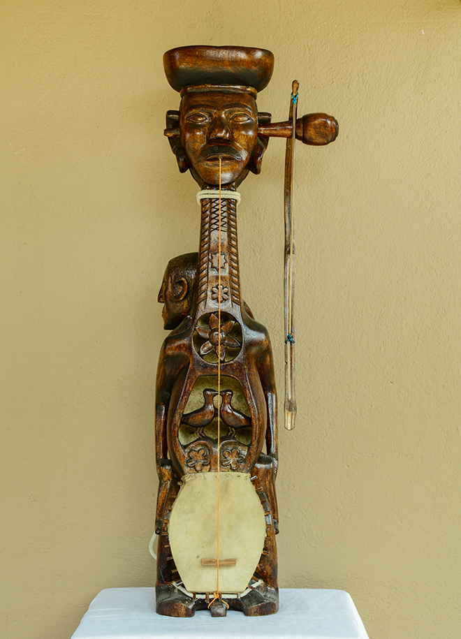 Image may contain: String instrument, Musical instrument, Plucked string instruments, Folk instrument, Rebab.