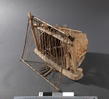(UEM12191)&amp;#160;Rev. Bodding’s notes: 'The lure is inside the cage. When the catch is ongoing the cage is put on the ground and the net is tied. It is very common that shepherd boys carry this kind of cages with traps along. As soon as they hear a gundri cooing they arrange the trap and the play begins.'