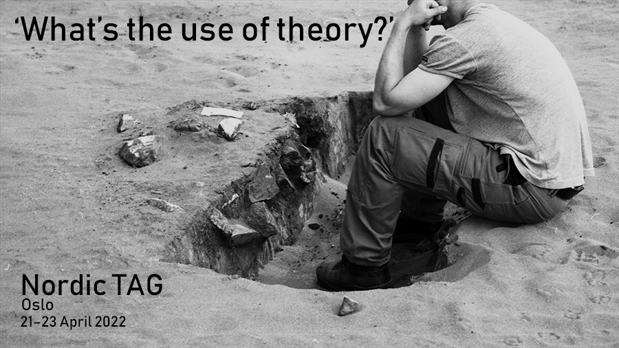 Black and white photo of field archaeologist looking at the profile of a cooking pit.