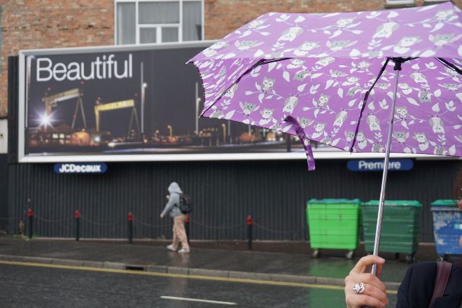 Image may contain: Umbrella, Purple, Advertising.