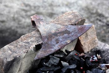 Wood ,Road surface ,Charcoal ,Bedrock ,Natural material.